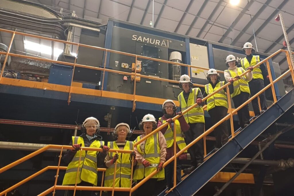 Group of people in Hi Vis jackets on a stairway