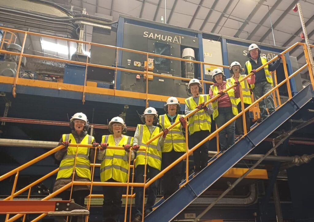 Group of people in Hi Vis jackets on a stairway