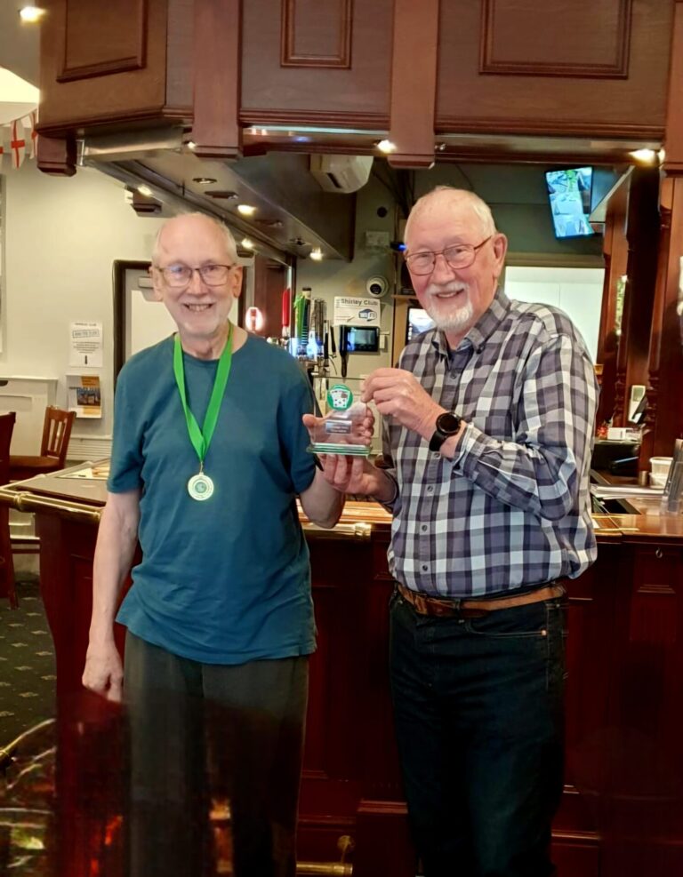 Two Men with Trophy